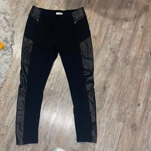 Leggings that look like black jeans, with a leather stripe.